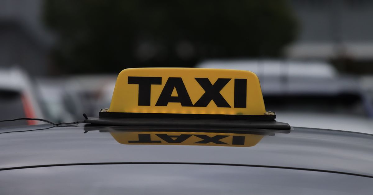 A taxi on a UK street